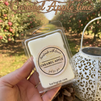 Caramel Apple soy wax melt in a decorative apple orchard background.